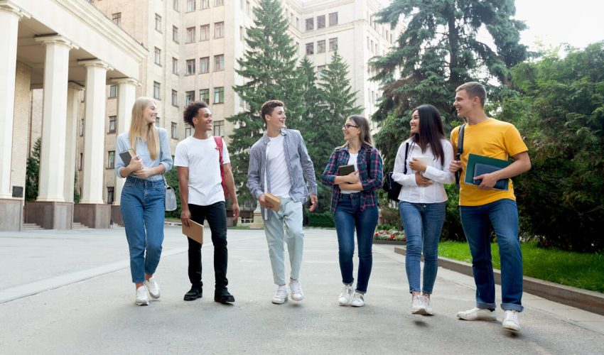 happy-students-walking-in-university